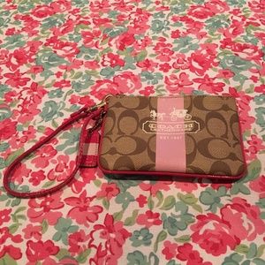 Brown and Pink Coach Wristlet